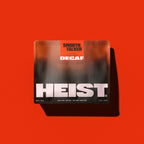 Top-down view of Smooth Talker decaf coffee bag showing HEIST logo and orange SMOOTH TALKER label on a red background